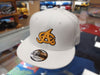 Aguilas Cibaeñas NEW ERA SnapBack GOLD Logo white Hat