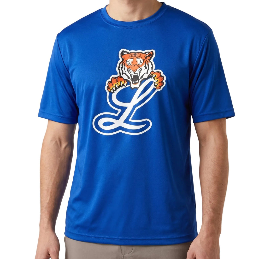 A man wearing a royal blue short-sleeve athletic t-shirt with a large graphic of a tiger and the letter 'L' on the chest, paired with khaki pants against a white background.
