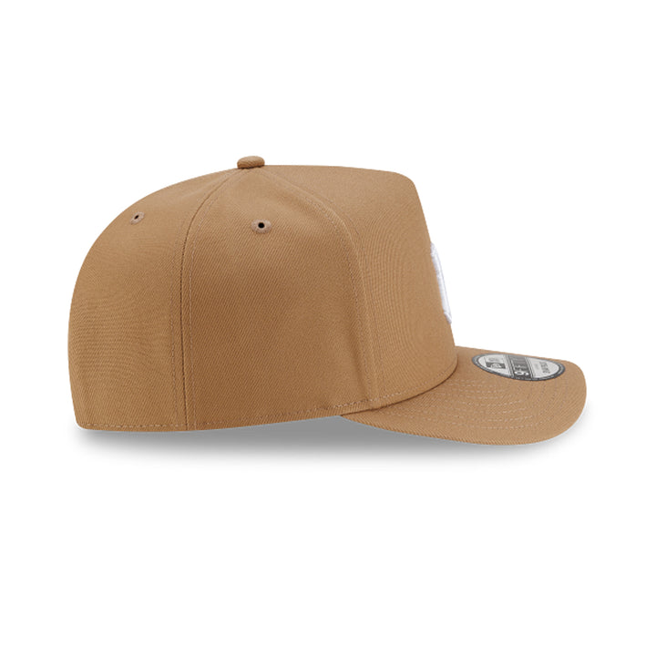 Side view of khaki Yankees adjustable baseball cap