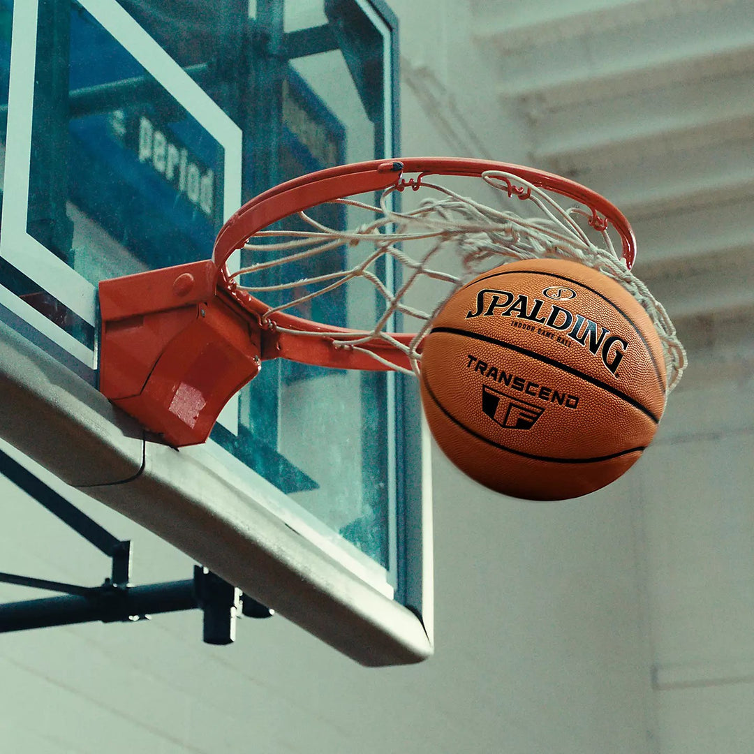 Spalding TF Transcend indoor basketball close-up showing backboard