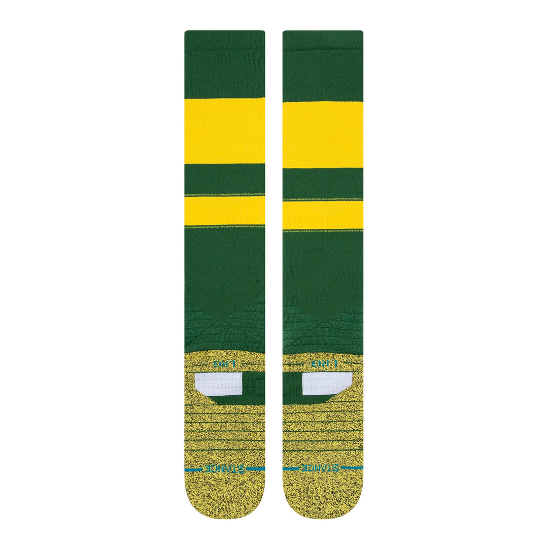 Rear profile green and yellow Stance performance baseball socks