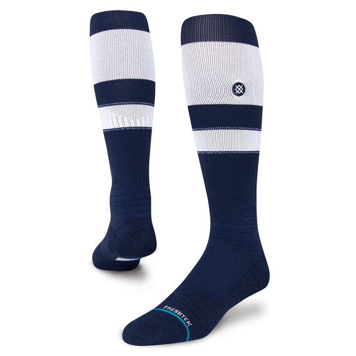 Angled view white and navy Stance over-the-calf baseball socks